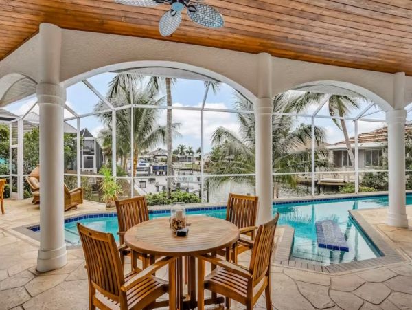 Marco Island Canal Front Three Bedroom Vacation Rental with Caged Pool