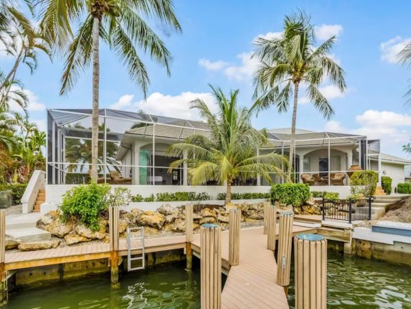 Marco Island Canal Front Three Bedroom Vacation Rental with Caged Pool