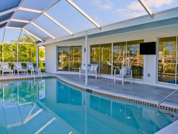 Canal-Front Vacation Home with Pool & Dock