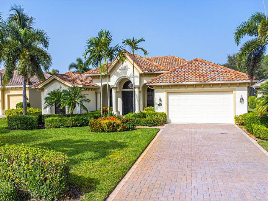 Naples Four Bedroom Vacation Rental with Caged Pool and Lake View