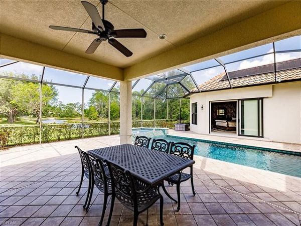 Naples Four Bedroom Vacation Rental with Caged Pool and Lake View