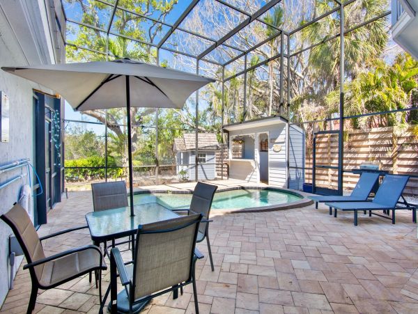 Siesta Key Vacation Rental Luxury 4-Bedroom Canal-Front Home with Pool & Dock