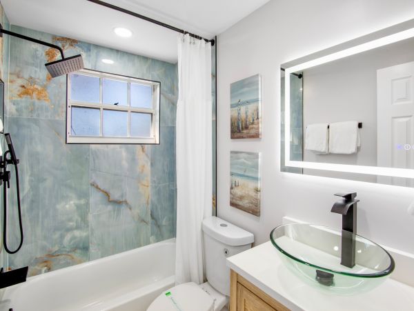 Siesta Key Vacation Rental Luxury 4-Bedroom Canal-Front Home with Pool & Dock