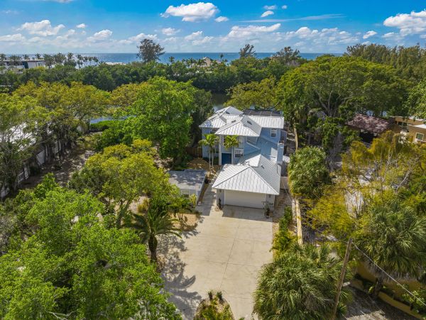 Siesta Key Vacation Rental Luxury 4-Bedroom Canal-Front Home with Pool & Dock