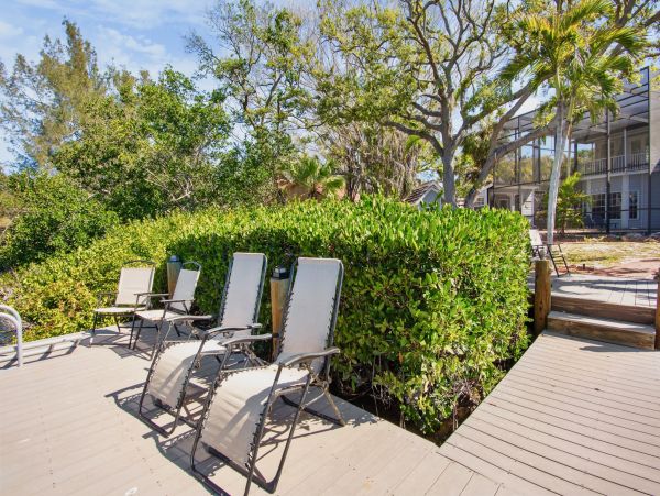 Siesta Key Vacation Rental Luxury 4-Bedroom Canal-Front Home with Pool & Dock