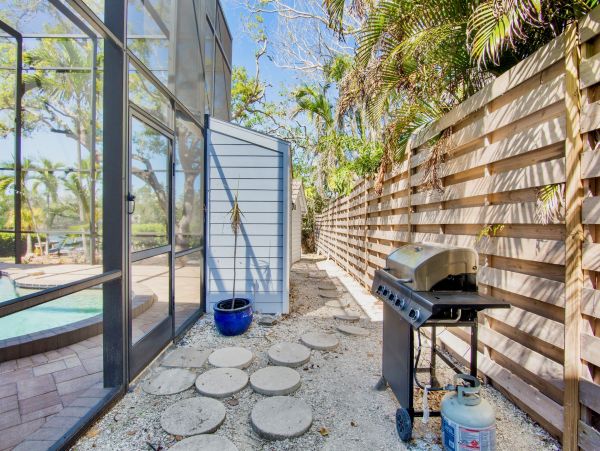Siesta Key Vacation Rental Luxury 4-Bedroom Canal-Front Home with Pool & Dock