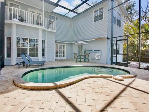 Siesta Key Vacation Rental Luxury 4-Bedroom Canal-Front Home with Pool & Dock