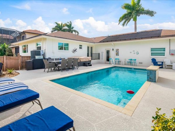 Classy Waterfront Three Bedroom Home with Private Pool