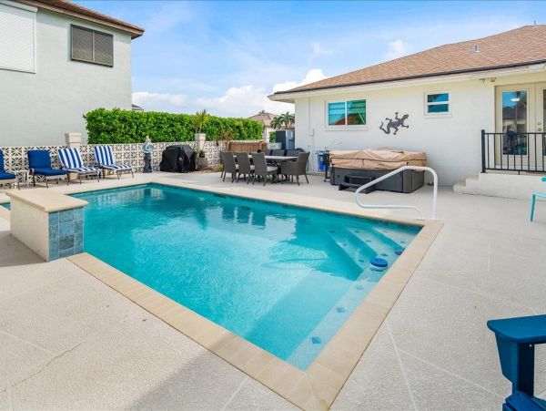 Classy Waterfront Three Bedroom Home with Private Pool