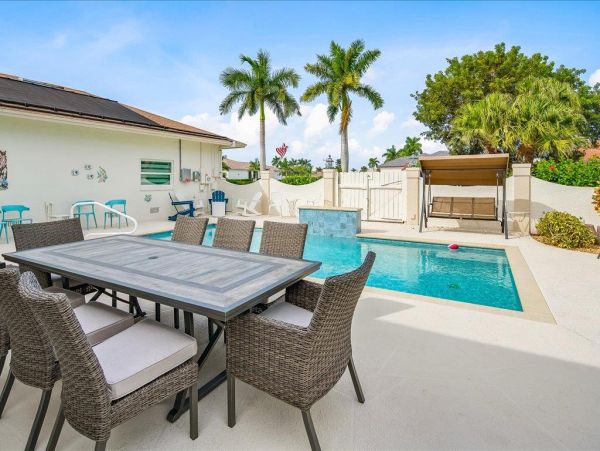 Classy Waterfront Three Bedroom Home with Private Pool
