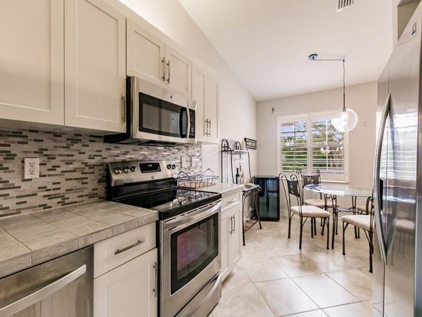 Second-Floor Condo with 2 Bedrooms & Lake Views