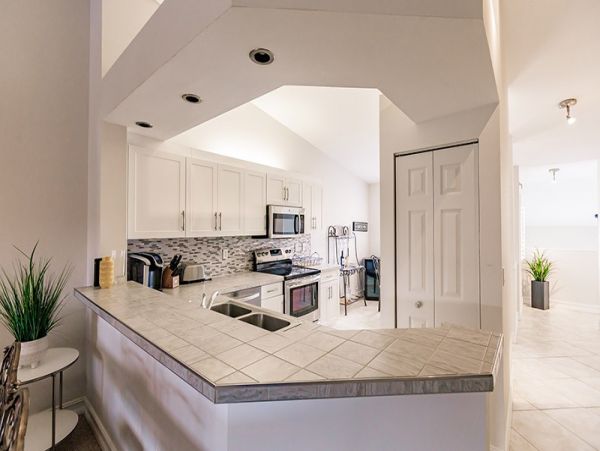 Second-Floor Condo with 2 Bedrooms & Lake Views