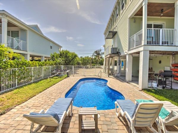 Stunning Sombrero Beach Townhome Canal Front with Pool