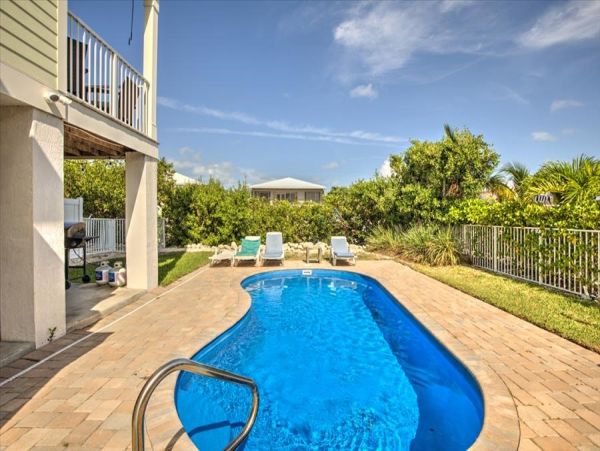 Stunning Sombrero Beach Townhome Canal Front with Pool