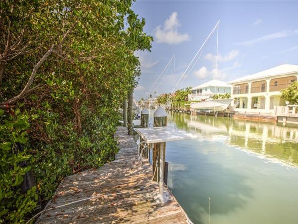 Stunning Sombrero Beach Townhome Canal Front with Pool