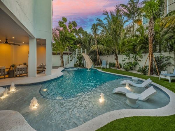Luxury Lido Key Vacation Rental  Sarasota Beachfront Home with Rooftop Deck & Pool