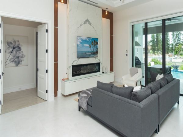 Luxurious Coastal Retreat - 4-Bedroom Waterfront Home with Pool, Theater, and Fitness Room