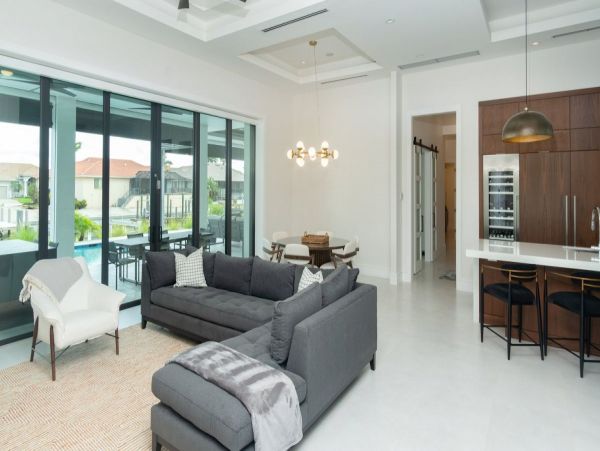 Luxurious Coastal Retreat - 4-Bedroom Waterfront Home with Pool, Theater, and Fitness Room