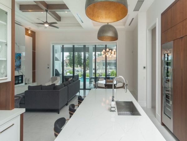 Luxurious Coastal Retreat - 4-Bedroom Waterfront Home with Pool, Theater, and Fitness Room