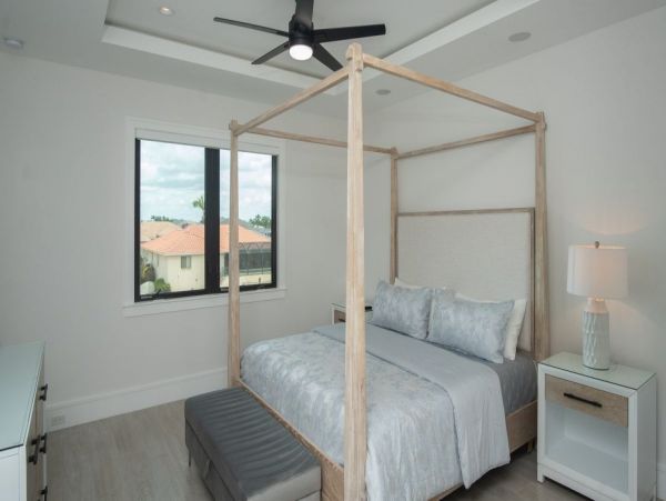 Luxurious Coastal Retreat - 4-Bedroom Waterfront Home with Pool, Theater, and Fitness Room