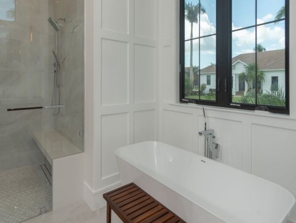 Luxurious Coastal Retreat - 4-Bedroom Waterfront Home with Pool, Theater, and Fitness Room