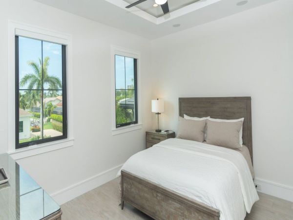 Luxurious Coastal Retreat - 4-Bedroom Waterfront Home with Pool, Theater, and Fitness Room