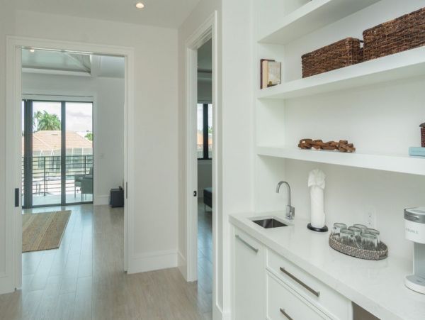 Luxurious Coastal Retreat - 4-Bedroom Waterfront Home with Pool, Theater, and Fitness Room