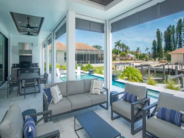 Luxurious Coastal Retreat - 4-Bedroom Waterfront Home with Pool, Theater, and Fitness Room