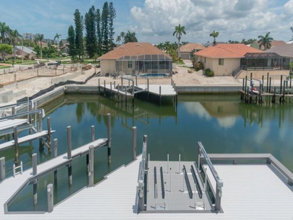 Luxurious Coastal Retreat - 4-Bedroom Waterfront Home with Pool, Theater, and Fitness Room