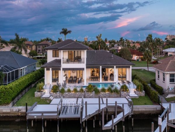 Luxurious Coastal Retreat - 4-Bedroom Waterfront Home with Pool, Theater, and Fitness Room