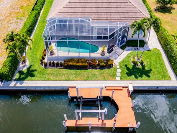 Waterfront Retreat with Private Caged Pool in Marco Island