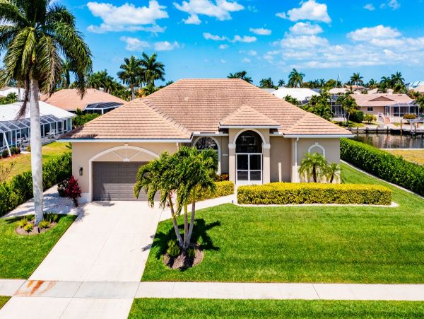 Waterfront Retreat with Private Caged Pool in Marco Island