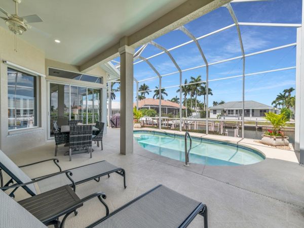 Waterfront Retreat with Private Caged Pool in Marco Island