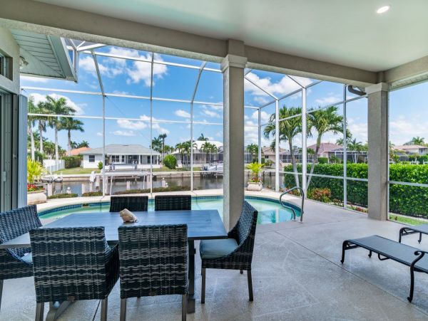 Waterfront Retreat with Private Caged Pool in Marco Island
