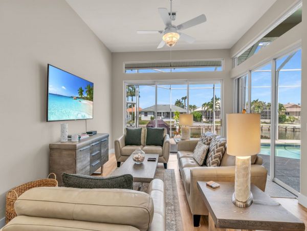 Waterfront Retreat with Private Caged Pool in Marco Island
