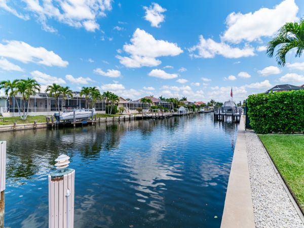 Waterfront Retreat with Private Caged Pool in Marco Island