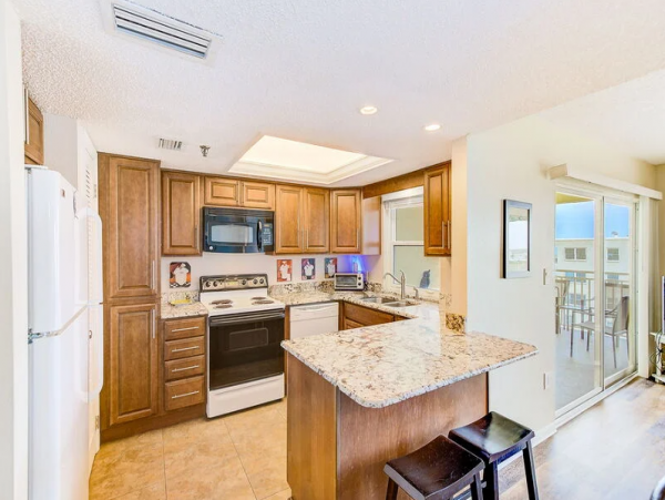 Redington Shores Beachfront Condo with Pool and Hot Tub