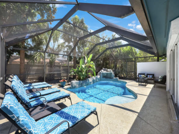Three Bedroom Tropical Oasis in Naples with Caged Pool