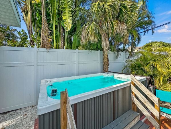 Idyllic Family Retreat with 2 Bedrooms & 1/2 Block to Beach