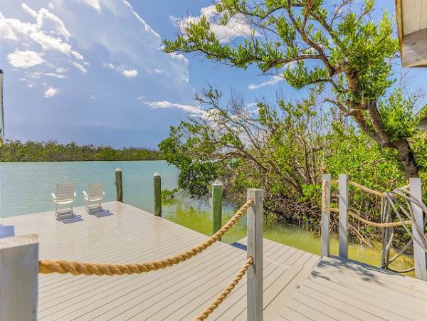 Bay Front One Bedroom Vacation Rental with Private Caged Pool