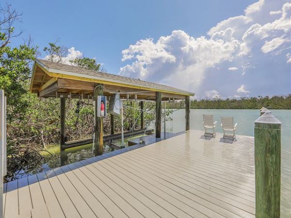 Bay Front One Bedroom Vacation Rental with Private Caged Pool