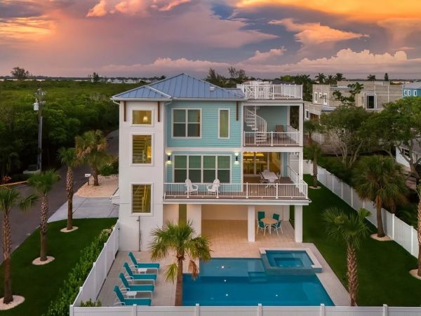 Stunning 3-Story Longboat Key Home with Private Pool & Spa Private Beach Access