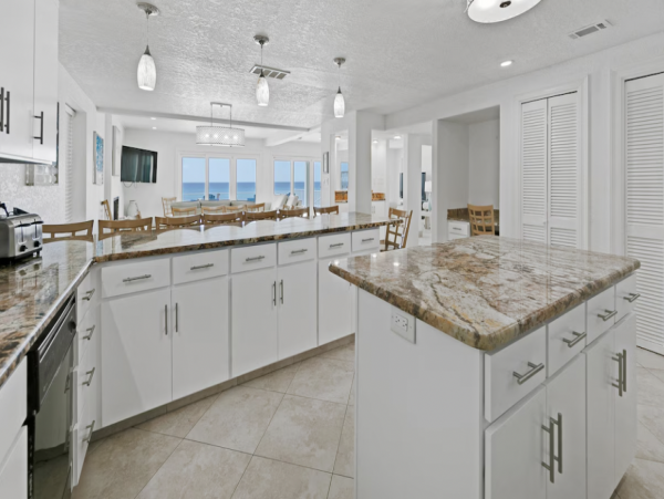 Direct Beachfront Two Bedroom Luxury Condo Sleeps 7