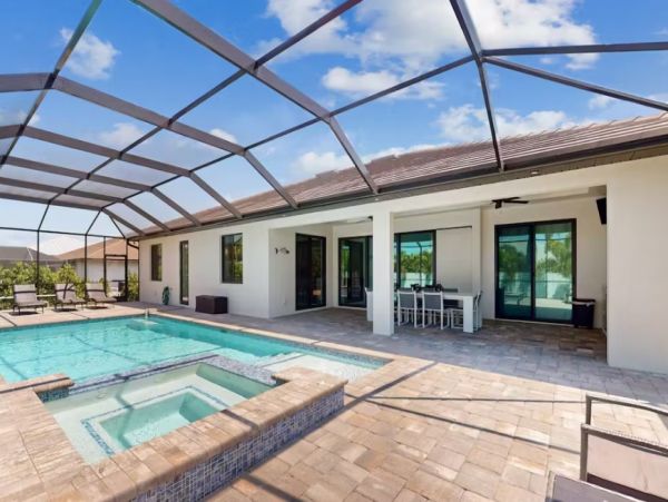 Cape Coral Luxury Four Bedroom Rental with Caged Pool