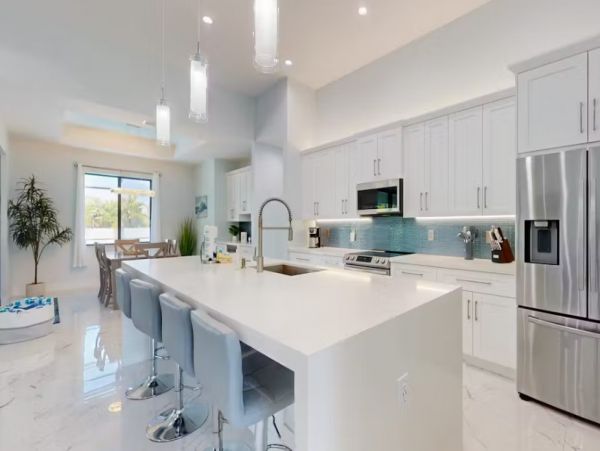 Cape Coral Luxury Four Bedroom Rental with Caged Pool