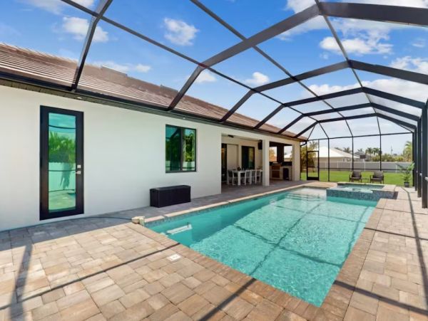 Cape Coral Luxury Four Bedroom Rental with Caged Pool