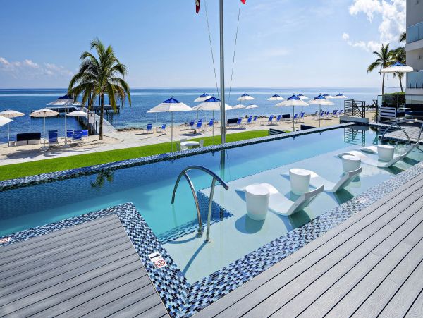 Cayman Islands Vacation Rental: Modern Condo with Rooftop Views
