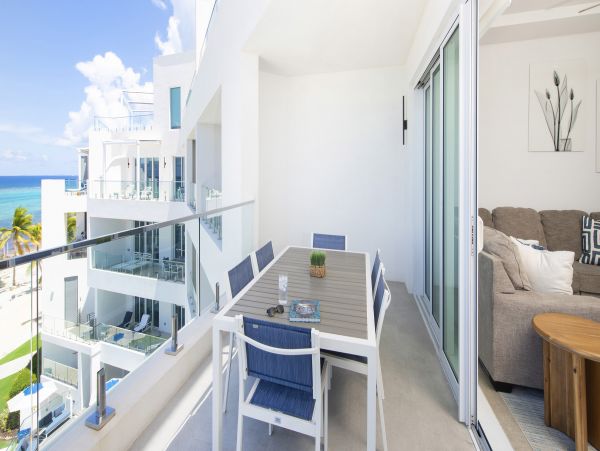 Cayman Islands Vacation Rental: Modern Condo with Rooftop Views