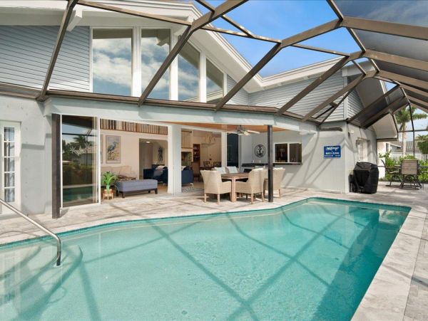 Spacious Waterfront Marco Island Home with Screened Pool
