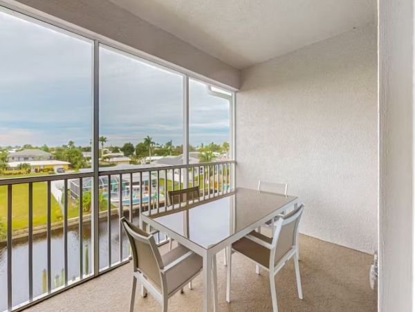 Canal-front Condo with Saltwater Pool and Boat Slip in Cape Coral